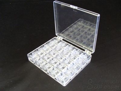 25 Empty Plastic Bobbins + Storage Box